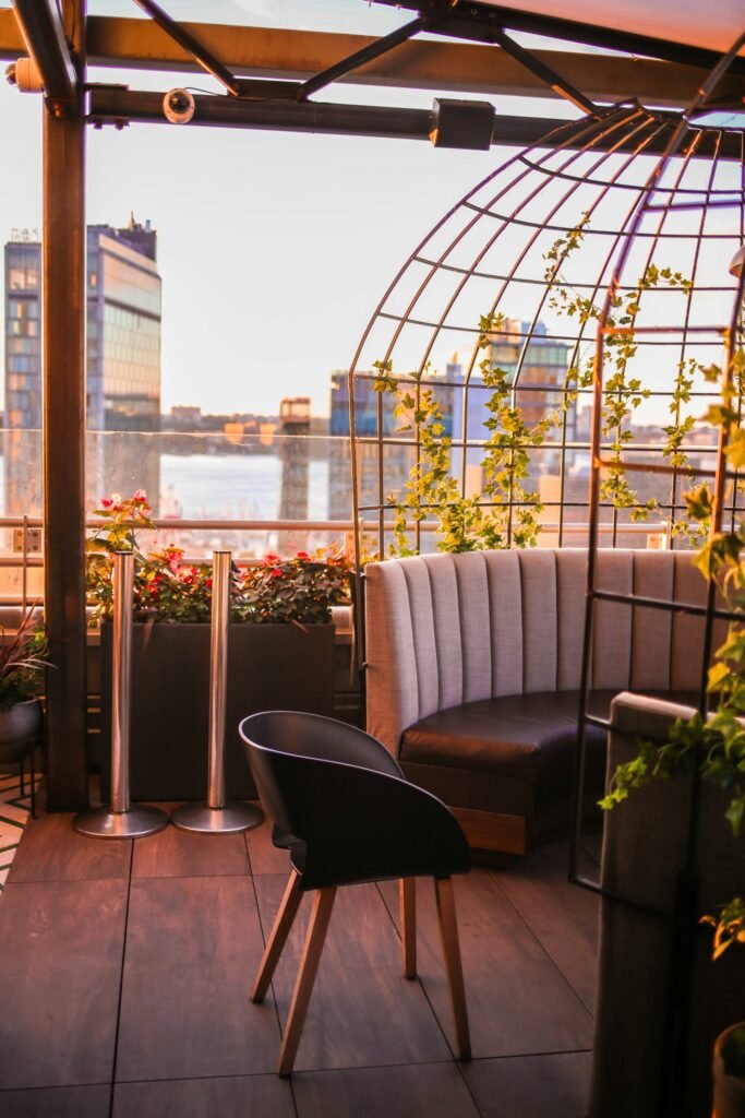New York City rooftop event space hosting a phygital corporate gathering, blending physical networking with digital insights and panoramic city views.